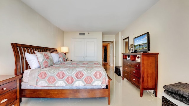 4740 S Ocean Blvd Unit 710, Highland Beach, FL 33487 - bedroom with light tile patterned floors and a closet