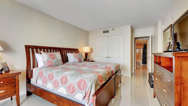 4740 S Ocean Blvd Unit 710, Highland Beach, FL 33487 - bedroom with a closet, light tile patterned flooring, and baseboards