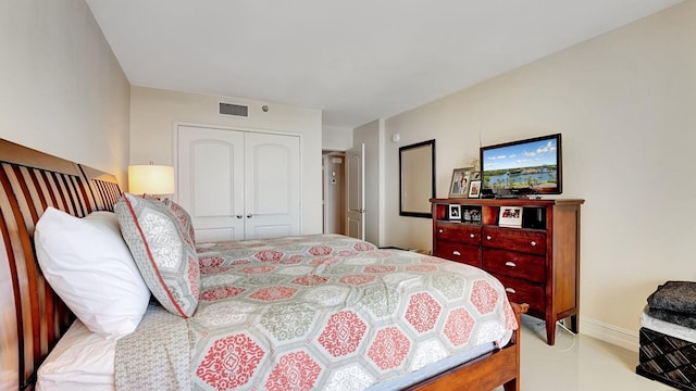 4740 S Ocean Blvd Unit 710, Highland Beach, FL 33487 - bedroom featuring a closet and baseboards