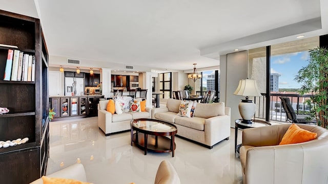4740 S Ocean Blvd Unit 710, Highland Beach, FL 33487 - living area with a chandelier and recessed lighting