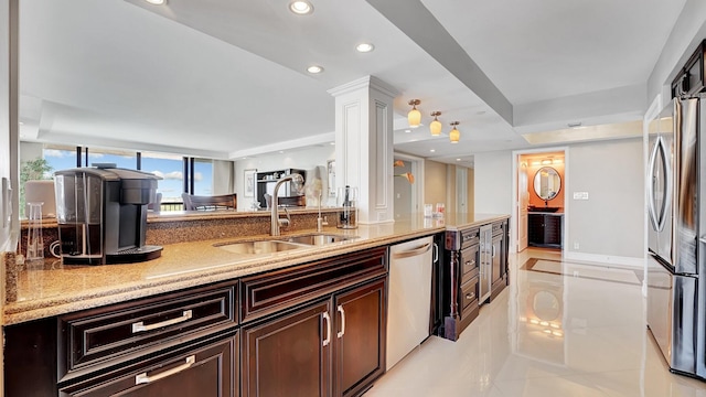 4740 S Ocean Blvd Unit 710, Highland Beach, FL 33487 - kitchen with a sink, appliances with stainless steel finishes, light stone countertops, recessed lighting, and light tile patterned floors