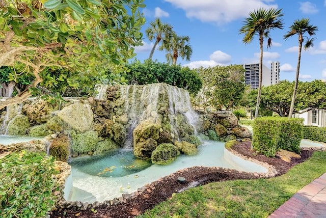 4740 S Ocean Blvd Unit 710, Highland Beach, FL 33487 - view of community with a garden pond