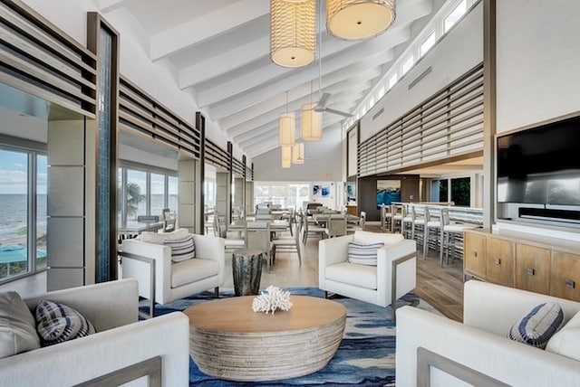4740 S Ocean Blvd Unit 710, Highland Beach, FL 33487 - common area with beam ceiling and high vaulted ceiling