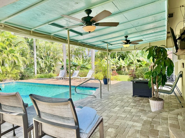 14109 Leeward Way, Palm Beach Gardens, FL 33410 - outdoor pool featuring ceiling fan and a patio