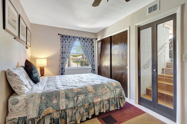 14109 Leeward Way, Palm Beach Gardens, FL 33410 - bedroom featuring french doors and ceiling fan