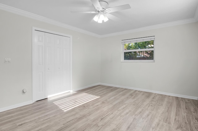 1560 SW 16th St, Boca Raton, FL 33486 - unfurnished bedroom featuring light wood-type flooring, a closet, ornamental molding, baseboards, and a ceiling fan