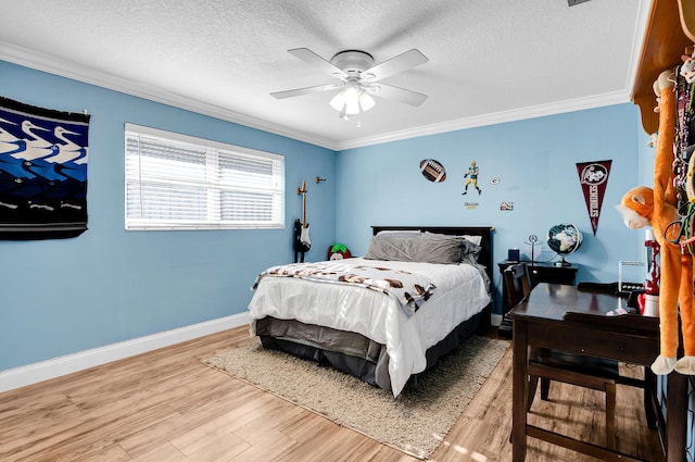 1560 SW 16th St, Boca Raton, FL 33486 - bedroom with light wood-style floors, crown molding, a textured ceiling, baseboards, and a ceiling fan
