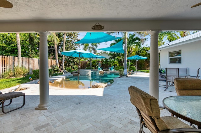 1560 SW 16th St, Boca Raton, FL 33486 - view of patio / terrace featuring a fenced backyard and a pool with connected hot tub
