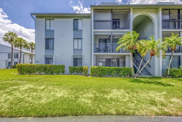 1011 Green Pine Blvd Unit G1, West Palm Beach, FL 33409 - view of property featuring stairs