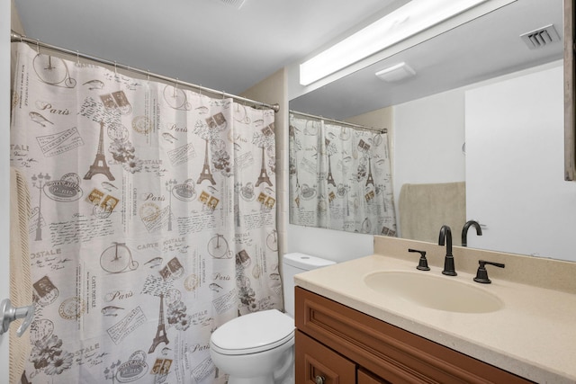 1011 Green Pine Blvd Unit G1, West Palm Beach, FL 33409 - bathroom with toilet, vanity, and curtained shower