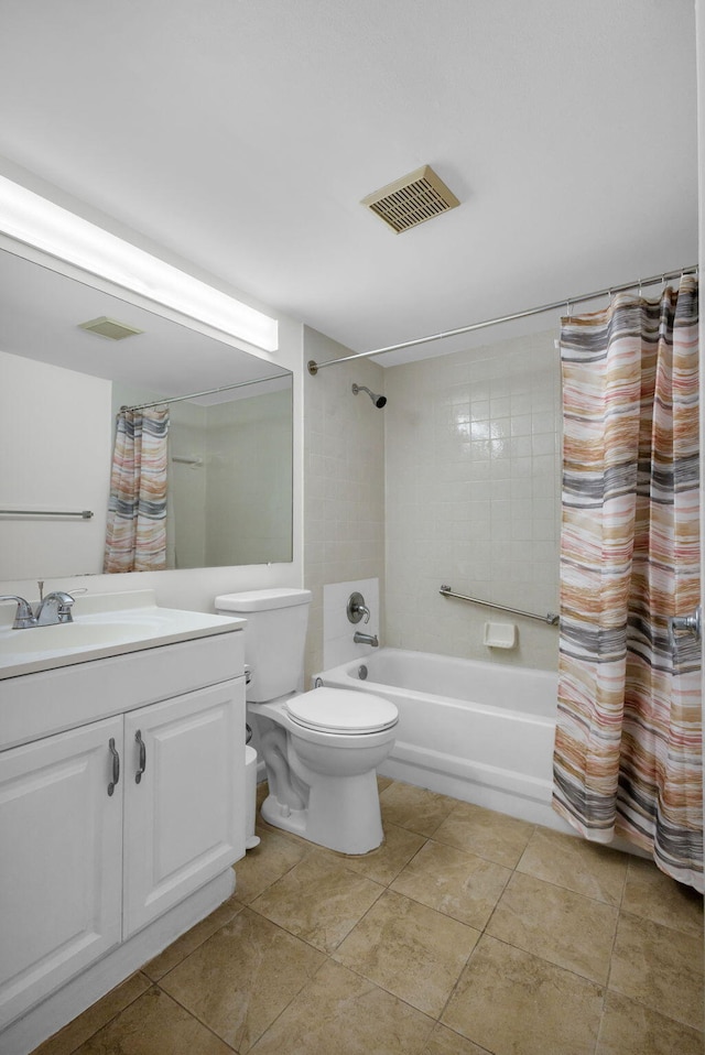 1011 Green Pine Blvd Unit G1, West Palm Beach, FL 33409 - bathroom with vanity, shower / bath combo with shower curtain, toilet, and tile patterned flooring