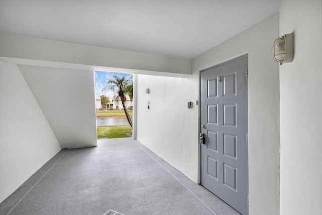 1011 Green Pine Blvd Unit G1, West Palm Beach, FL 33409 - view of exterior entry with a water view