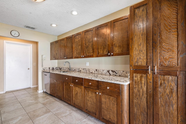 21212 Escondido Way, Boca Raton, FL 33433 - kitchen with a sink, dishwasher, light tile patterned floors, light stone counters, and baseboards