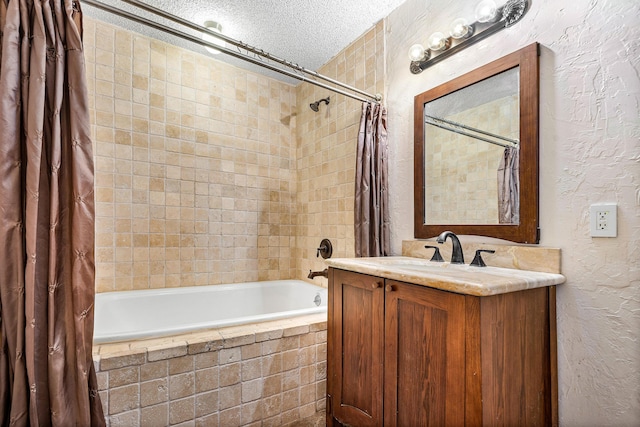 21212 Escondido Way, Boca Raton, FL 33433 - full bath with tiled shower / bath combo, a textured ceiling, a textured wall, and vanity