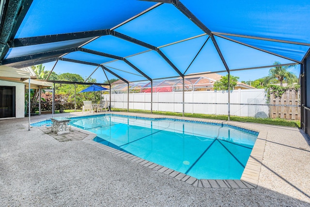 21212 Escondido Way, Boca Raton, FL 33433 - view of swimming pool featuring a patio and a lanai
