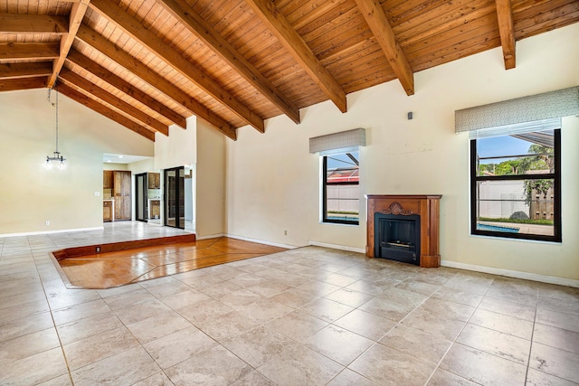 21212 Escondido Way, Boca Raton, FL 33433 - unfurnished living room featuring plenty of natural light, wooden ceiling with exposed beams, light tile patterned flooring, a fireplace, and high vaulted ceiling