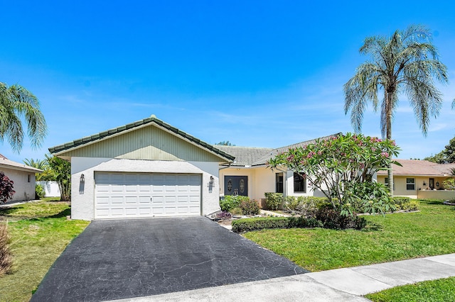 21212 Escondido Way, Boca Raton, FL 33433 - ranch-style home featuring a tiled roof, driveway, a garage, a front yard, and stucco siding