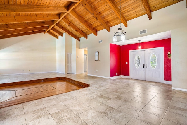 21212 Escondido Way, Boca Raton, FL 33433 - foyer featuring wooden ceiling with exposed beams, high vaulted ceiling, and baseboards