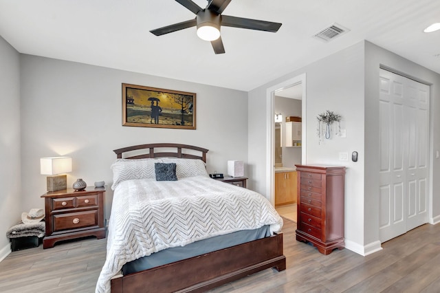 609 Amador Ln Unit 4, West Palm Beach, FL 33401 - bedroom featuring light wood finished floors, baseboards, a closet, and ceiling fan