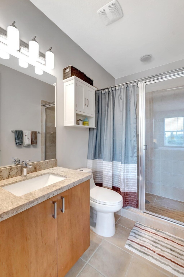 609 Amador Ln Unit 4, West Palm Beach, FL 33401 - full bath featuring a stall shower, vanity, toilet, and tile patterned floors