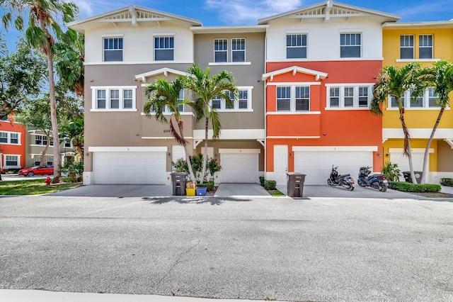 609 Amador Ln Unit 4, West Palm Beach, FL 33401 - multi unit property featuring stucco siding and a garage