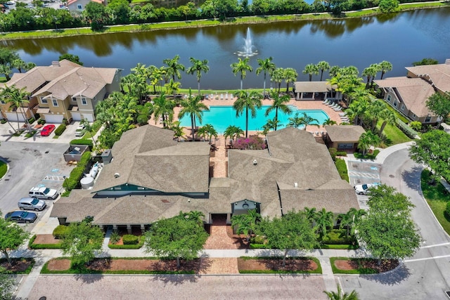 609 Amador Ln Unit 4, West Palm Beach, FL 33401 - drone / aerial view of a pool area and a large body of water