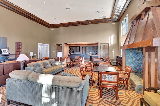 609 Amador Ln Unit 4, West Palm Beach, FL 33401 - living area with a towering ceiling and crown molding