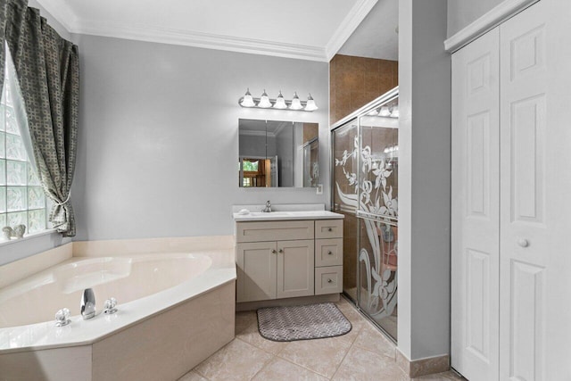 full bathroom with a closet, ornamental molding, a shower stall, a bath, and vanity