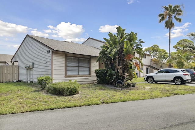 116 Sherwood Cir Unit 7A, Jupiter, FL 33458 - view of front facade featuring roof with shingles