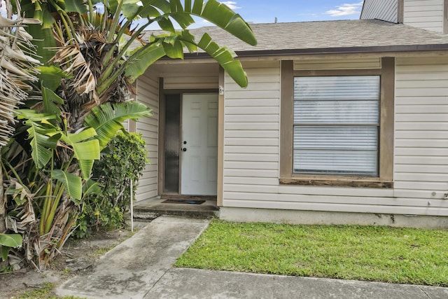 116 Sherwood Cir Unit 7A, Jupiter, FL 33458 - entrance to property featuring roof with shingles
