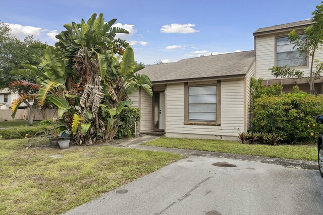 116 Sherwood Cir Unit 7A, Jupiter, FL 33458 - view of front of property with roof with shingles
