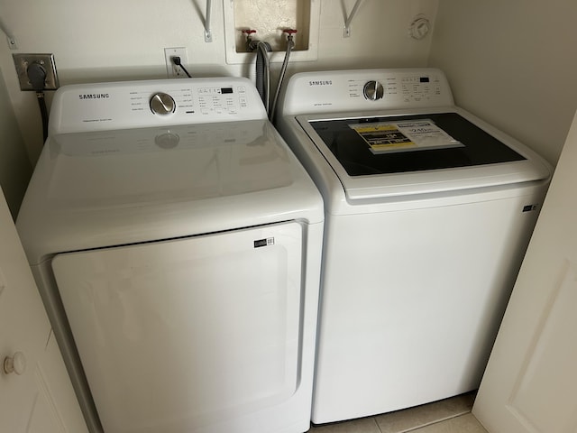 116 Sherwood Cir Unit 7A, Jupiter, FL 33458 - laundry area featuring washer and clothes dryer