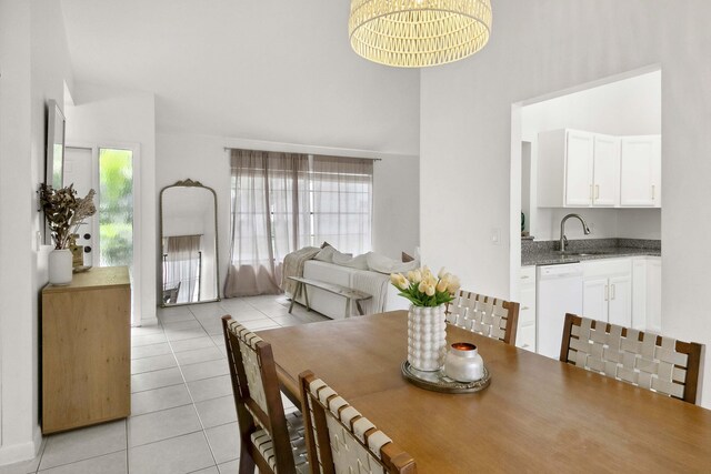 116 Sherwood Cir Unit 7A, Jupiter, FL 33458 - dining space with light tile patterned flooring, healthy amount of natural light, and a towering ceiling