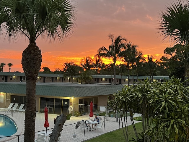 1081 SE Monterey Rd Unit 3-17, Stuart, FL 34994 - community pool with fence and a patio area