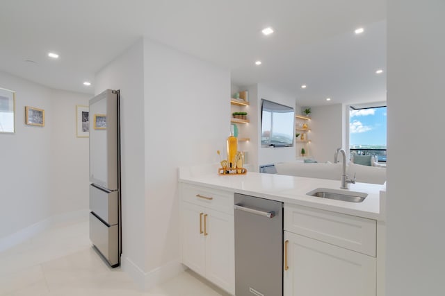 100 Lakeshore Dr Unit 1954, North Palm Beach, FL 33408 - kitchen featuring a sink, freestanding refrigerator, recessed lighting, white cabinets, and dishwasher