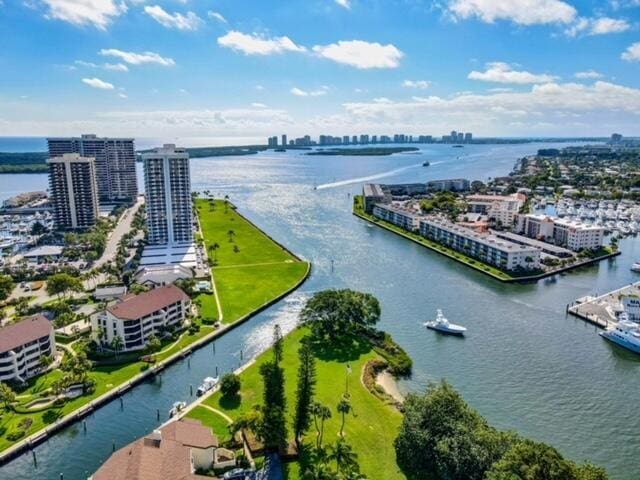 view of urban area featuring a nearby body of water