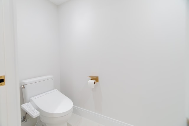 100 Lakeshore Dr Unit 1954, North Palm Beach, FL 33408 - bathroom featuring toilet and baseboards