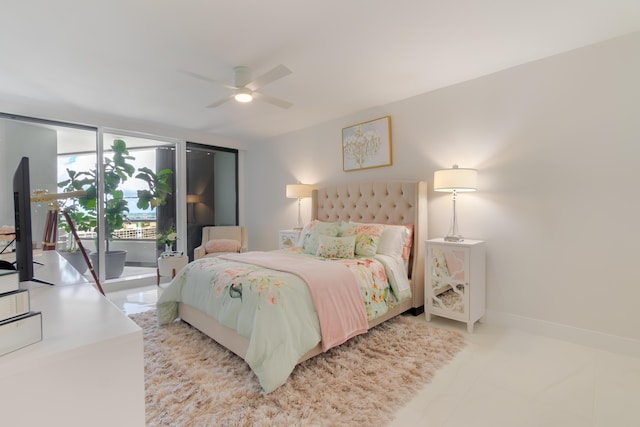100 Lakeshore Dr Unit 1954, North Palm Beach, FL 33408 - bedroom featuring access to exterior, a wall of windows, and a ceiling fan