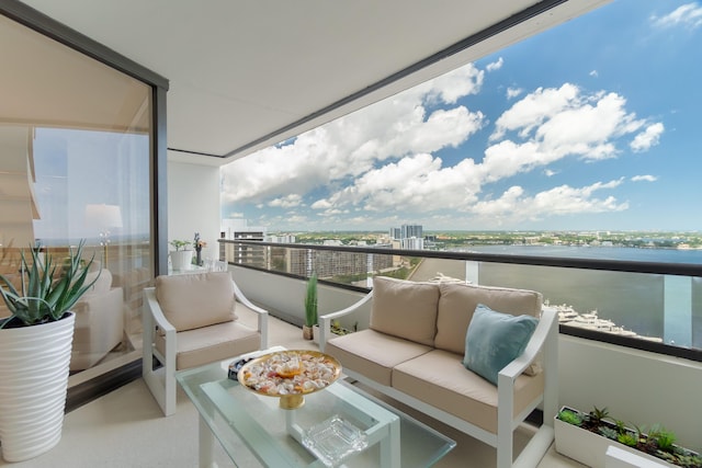 100 Lakeshore Dr Unit 1954, North Palm Beach, FL 33408 - balcony featuring outdoor lounge area and a water view