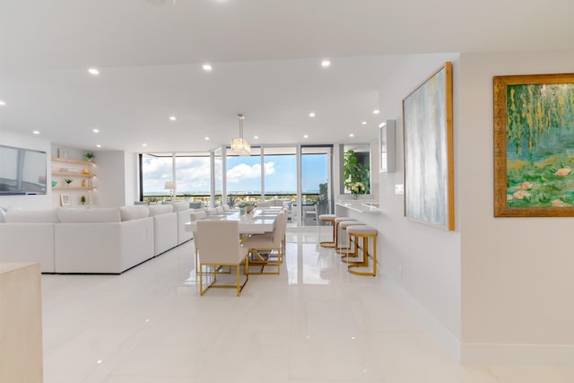 100 Lakeshore Dr Unit 1954, North Palm Beach, FL 33408 - dining room featuring recessed lighting and a wall of windows