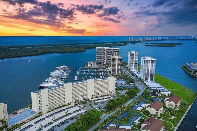 100 Lakeshore Dr Unit 1954, North Palm Beach, FL 33408 - aerial view at dusk of a water view and a city view