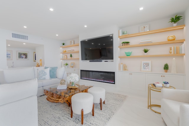 100 Lakeshore Dr Unit 1954, North Palm Beach, FL 33408 - living area featuring a glass covered fireplace and recessed lighting