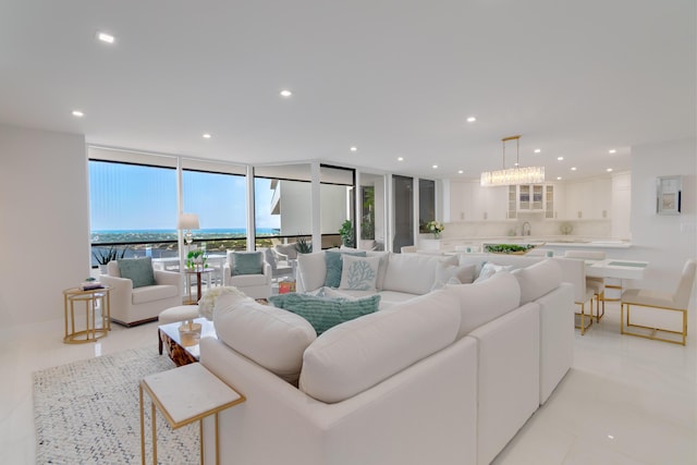 100 Lakeshore Dr Unit 1954, North Palm Beach, FL 33408 - living area with expansive windows, recessed lighting, and light tile patterned flooring