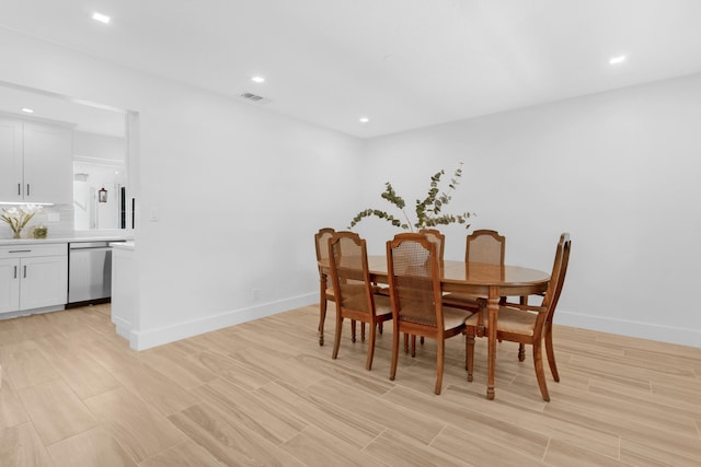 4060 Lake Dr, Coconut Creek, FL 33066 - dining room with light wood-style floors, baseboards, and recessed lighting