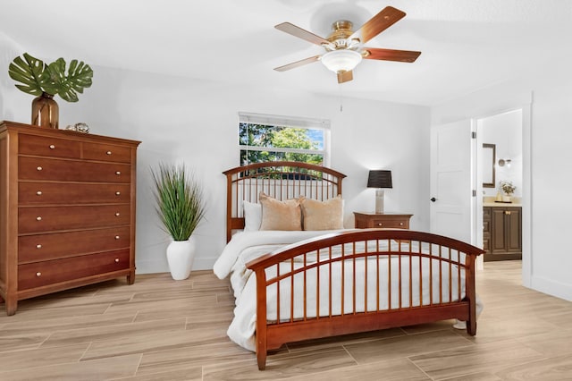 4060 Lake Dr, Coconut Creek, FL 33066 - bedroom featuring light wood-style flooring, baseboards, ensuite bathroom, and ceiling fan