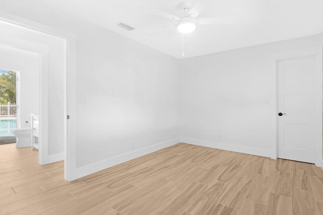 4060 Lake Dr, Coconut Creek, FL 33066 - spare room featuring light wood-style floors, ceiling fan, and baseboards
