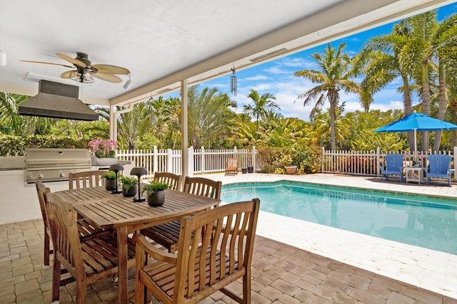 4060 Lake Dr, Coconut Creek, FL 33066 - view of swimming pool with a fenced backyard, a ceiling fan, a patio, and outdoor dining space