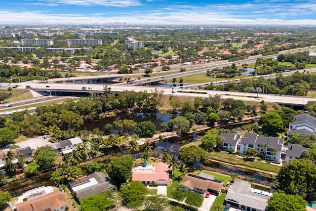 4060 Lake Dr, Coconut Creek, FL 33066 - aerial perspective of suburban area featuring a notable bridge, a large body of water, and a main thoroughfare