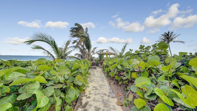 3421 S Ocean Blvd Unit 1, Highland Beach, FL 33487 - view of yard with a water view