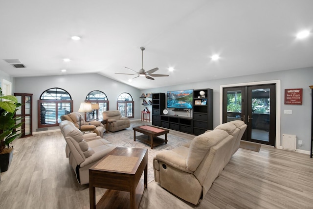 living room with light wood-type flooring, lofted ceiling, ceiling fan, baseboards, and recessed lighting